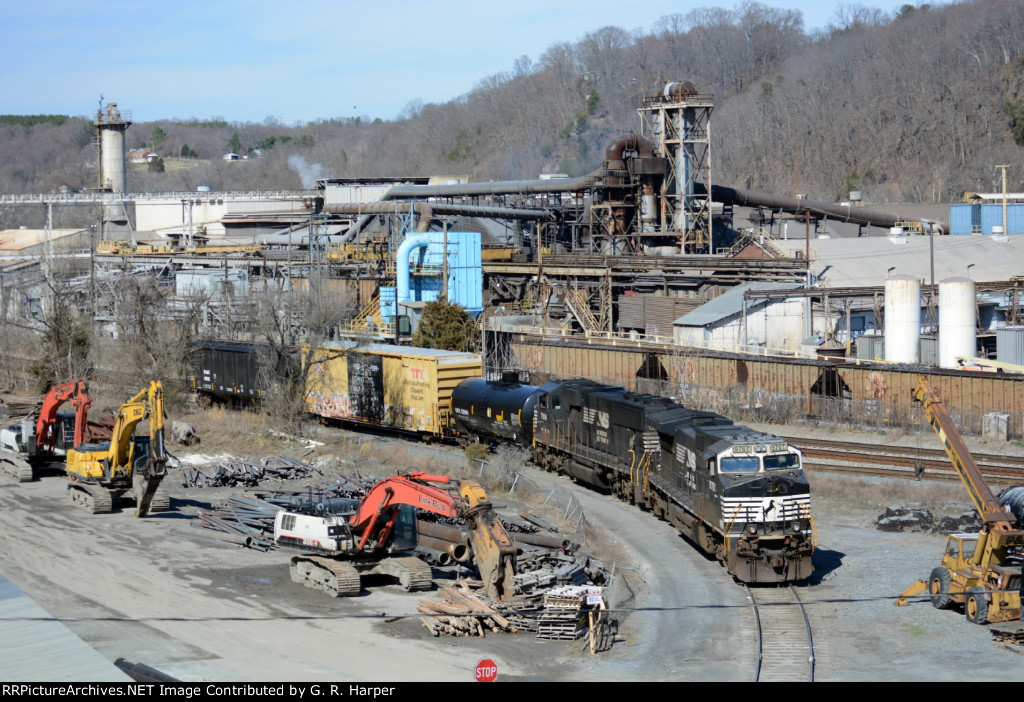 NS yard job E19 working the interchange yard.  U.S. Pipe, recently the former Griffin Pipe, in the background.